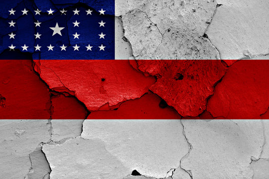 flag of Amazonas painted on cracked wall