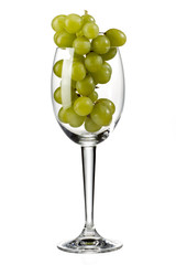 green grapes in wine glass