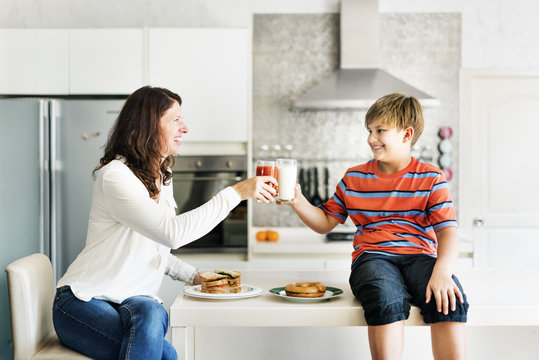 Mom and Son Eating Togetherness Cheerful Concept
