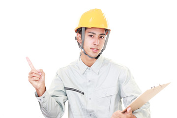 指示する笑顔の労働者