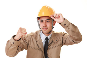 ガッツポーズの労働者