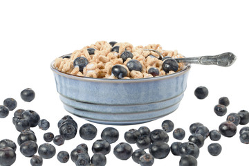 bowl of cereal flakes and grapes.