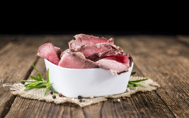 Roastbeef on a wooden table
