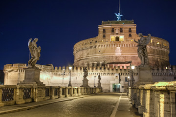 Fototapeta na wymiar Night view over ponte sant angelo leading to castel sant angelo at night. Rome, Italy.