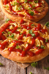 Hot langos fried with cheese and ketchup macro. Vertical
