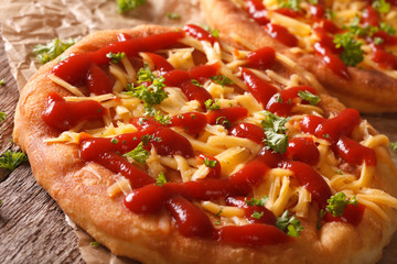 Hot langos fried with cheese and ketchup macro. horizontal
