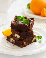Delicious chocolate brownie with caramel and orange.