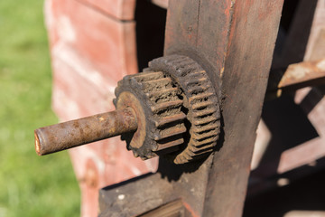 two gears rusted shaft outdoors