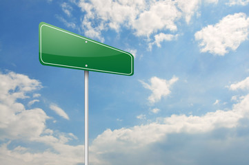 Green road sign over the blue sky