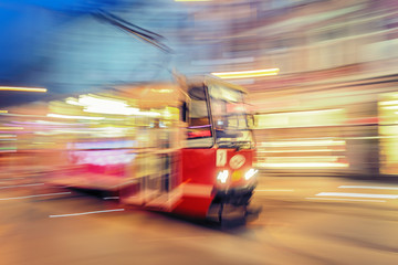 Tram on urban city street with motion blur effect. Katowice.