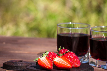 Strawberry and strawberry compote on the table