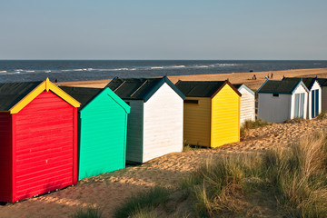 Colourful beach huts on Southwold beach Suffolk