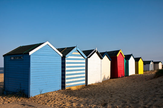 Colourful beach huts on Southwold beach Suffolk