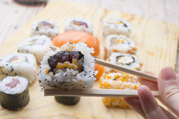 Fresh Homemade Sushi Roll against a background