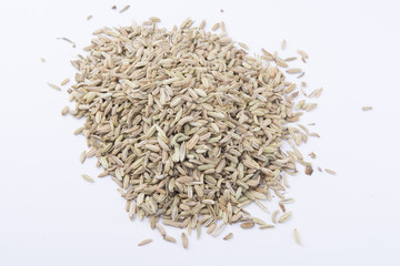 fennel seeds on white background