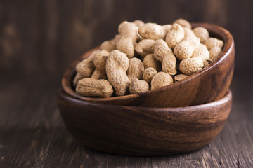 Peanuts in wooden bowls
