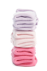 colorful of new kid's baby socks stacked and isolated