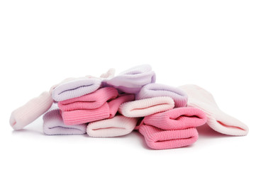 Obraz na płótnie Canvas colorful of new kid's baby socks stacked and isolated