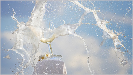Spilled Liqueur with broken glass A high speed photograph of a glass decorated with flowers that have been shot to create the bursting effect of the Liqueur 