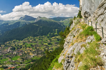 Beautiful idyllic Alps landscape and trail, mountains in summer, Switzerland
