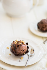 Chocolate Ice Cream Scoop is laying on Chocolate Homemade Bow