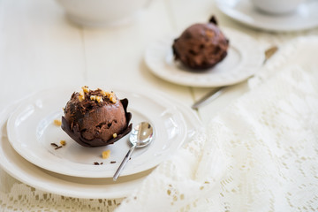Chocolate Ice Cream Scoop is laying on Chocolate Homemade Bow