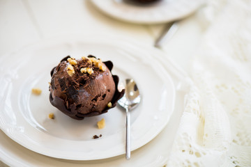 Chocolate Ice Cream Scoop is laying on Chocolate Homemade Bow