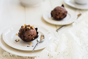 Chocolate Ice Cream Scoop is laying on Chocolate Homemade Bow