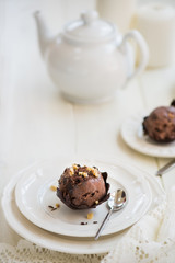 Chocolate Ice Cream Scoop is laying on Chocolate Homemade Bow