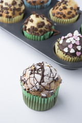 Chocolate Muffins with Sugar Icing. Isolated with clipping path.