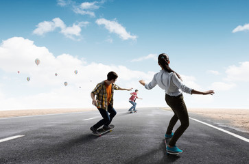 Young people riding skateboard