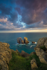 Sunrise at the coast, ocean and rocks in Cantabria, Spain