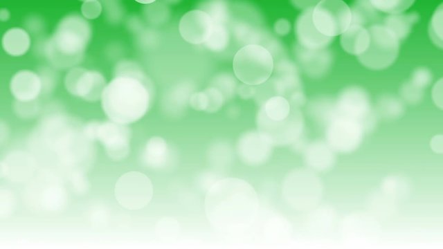 Abstract moving white bokeh on green background