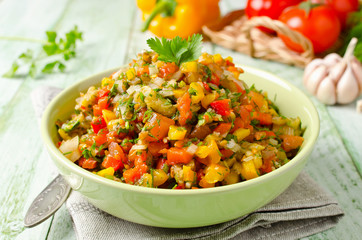 Grilled vegetables salad with yellow and red bell pepper, eggpla