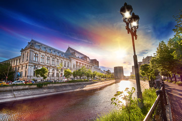 Bucharest, Romania -May 4, 2016: Dimbovita River and the Justice Palace in Unirii Square.