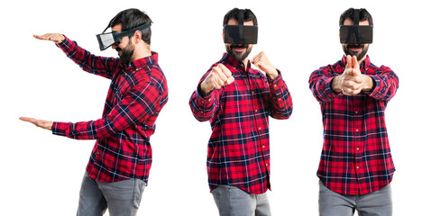 Man using VR glasses giving a punch