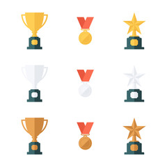 Set of gold, silver and bronze trophy cups, medals and star awards. Flat design vector illustration.
