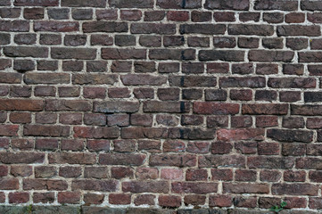 Mauer aus Backsteinen als Hintergrund