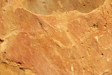 Fototapeta premium detail of an old orange sandstone surface