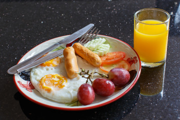 Breakfast sausage, fried egg