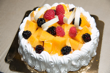 Fruit cake with milk cream,mango