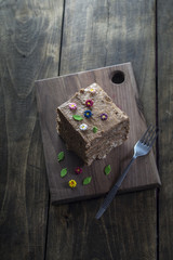 Delicious chocolate cakes on table