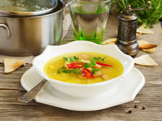 Lentil soup with curry sausages.