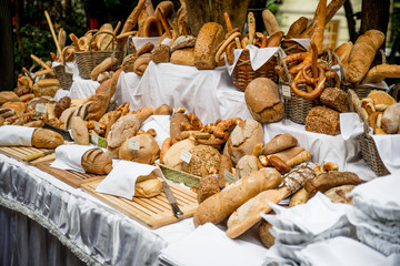 Fresh bread and pastry composed on the table