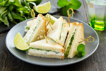 Vegetarian sandwich with cucumber and cream cheese.