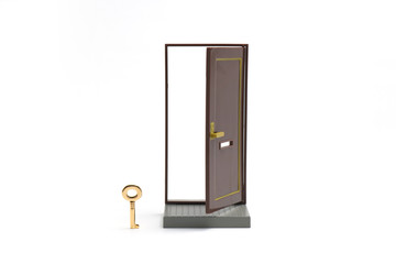 Home security.
Miniature door and key on white background.
