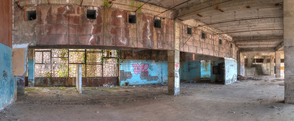 Panoramic view of the interior of abandoned dilapidated shopping center "Zhoekvara", Gagra, Abkhazia, HDR processing.