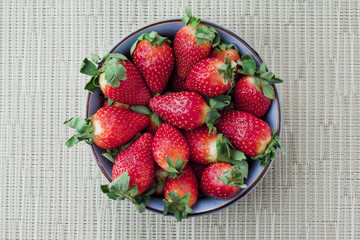 juicy strawberries in bowl.