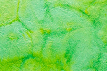 green painted crepe paper background