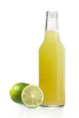 close-up image of lime juice and lemons.